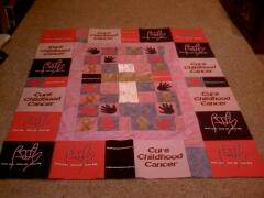 Awesome quilt designed by Betsy Farkas, Feb. 2009 - Betsy used Awareness Ribbon & Baby Handprint appliques to make this awesome quilt