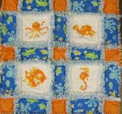 Sea Creature Rag Quilt designed by Carolyn Burgess, Sept. 2008  - she used the Sea Creature appliques to make this unique baby quilt for her new nephew