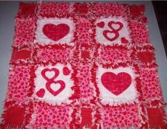 Valentine's Day rage quilt - Designed and sewn  by Heidi Dietz, Jan. 2009---- she used the double nested heart & heart appliques to make this beautiful wall hanging.