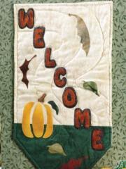 Create a lovely fall banner with letters and autumn leaf appliques