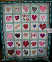 Here's an opportunity to use hearts & hands in a lovely quilt.,  Great idea for childhood cancer quilts, banners, etc.