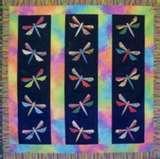 This is a gorgeous quilt using the dragonfly appliques.  Great for little girls of all ages.