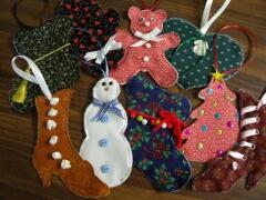 These cut ornaments were decorated by Susan Spaeth, September, 2009.  Sue used her creative scrapbooking techniques to embellish the ornaments.