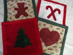 These are samples of Christmas potholders/hotpads designed by Carol Murphy, with adorable Christmas appliques