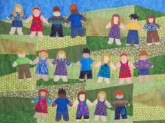 Quilt designed & sewn by Elizabeth Olney, May, 2010. Each of the children in kindergarten class created their own little person.  Some of them look like the child and others are pure fantasy.