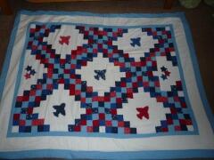 This adorable 'airplane' quilt was designed and sewn by Jana Honey, July, 2010.