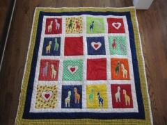 This adorable quilt with giraffes & hearts was made by Jimi Moore, April 2011 for her new grandson.  I am sure he will cherish it forever.