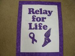 2014, March, Carol is busy, busy, busy.  Here is a Relay for Life wall hanging. Done as a fundraiser for Relay for Life.  She purchased the winged tennis shoes & letters from the website.